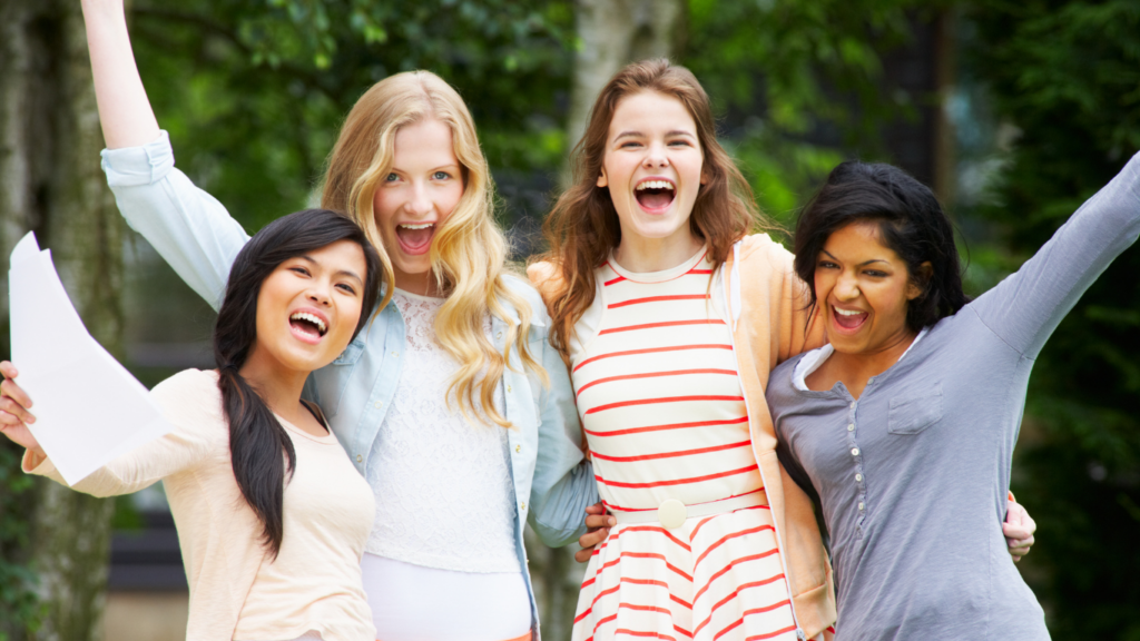 A group of female students celebrating